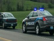 Police car stopping drivers