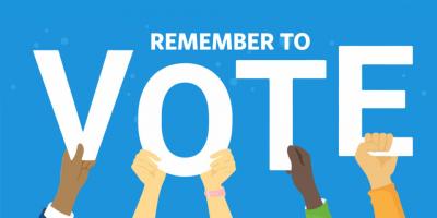 Cartoon hands holding a reminder to vote